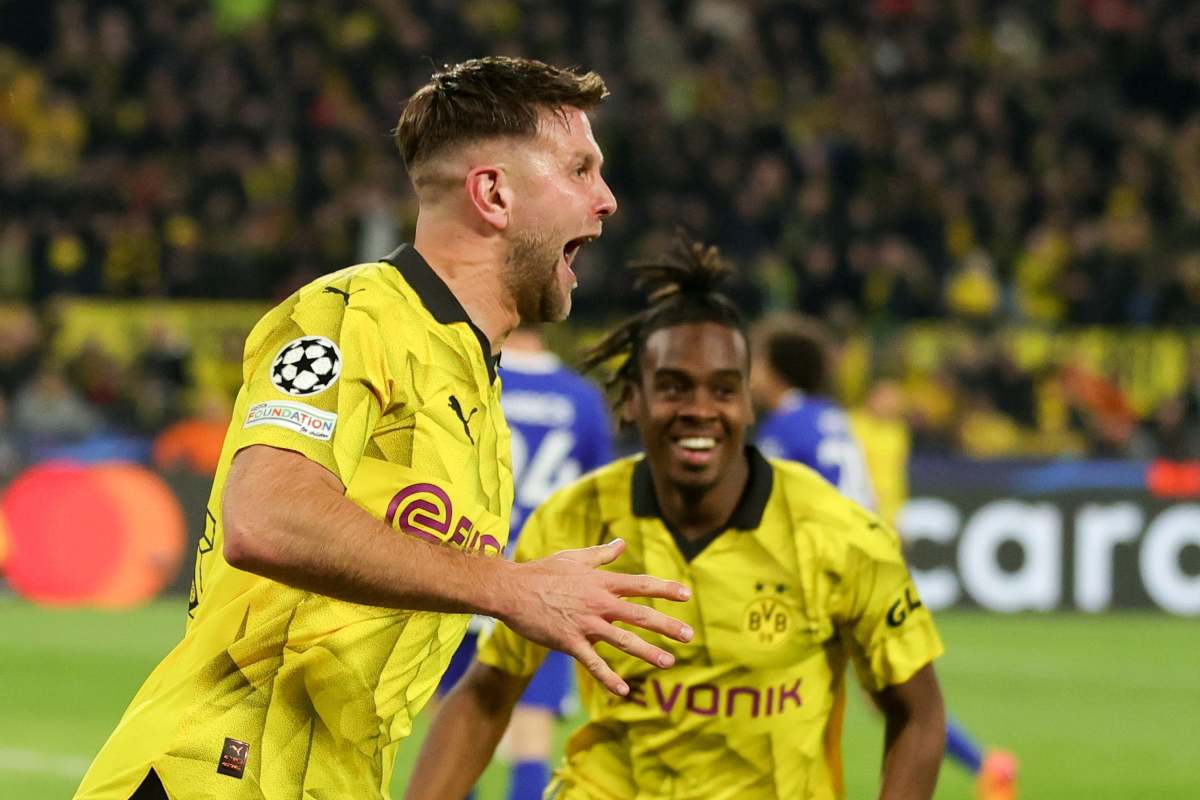 Fullkrug esulta correndo dopo un gol con il Borussia Dortmund