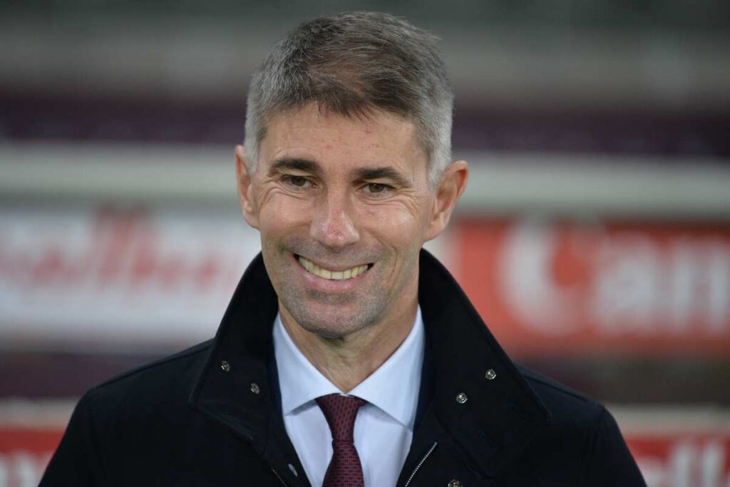 Primo piano di Massara sorridente